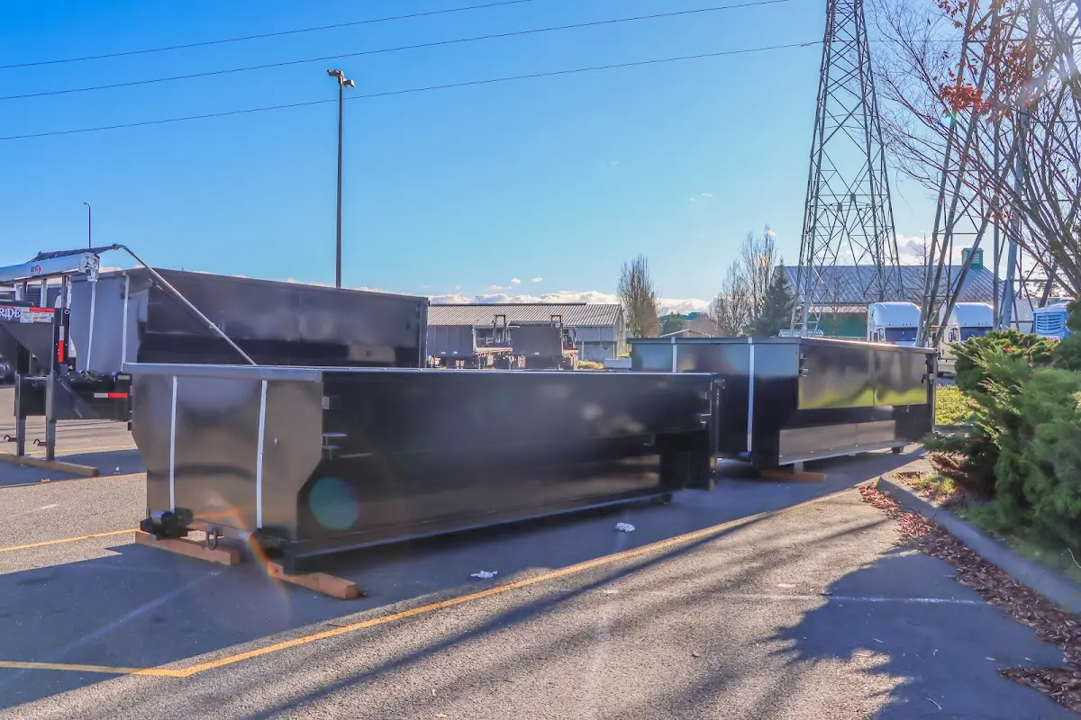 Roll-off dumpster ready for waste disposal at job site for 6 Yard Dumpster Rental in Simsbury